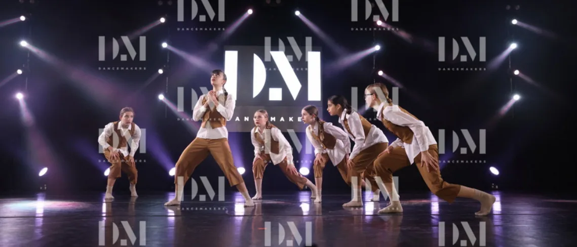 Teen Serendipity dancers performing together onstage